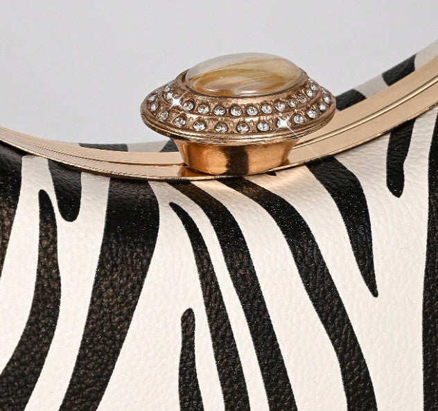 ONYX ZEBRA PRINT HARD CASE CLUTCH