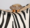 ONYX ZEBRA PRINT HARD CASE CLUTCH
