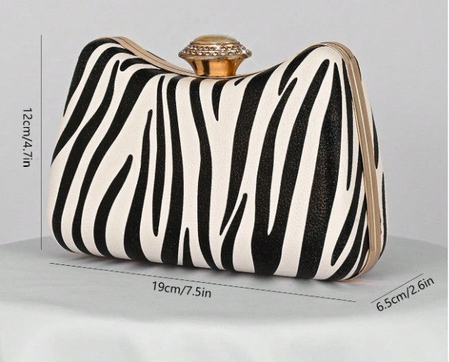 ONYX ZEBRA PRINT HARD CASE CLUTCH