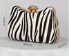 ONYX ZEBRA PRINT HARD CASE CLUTCH