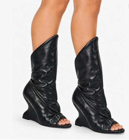 PACO-3 BLACK FAUX LEATHER  PEEP TOE BOOT WITH ASSYMETRICAL SHAFT AND SCULPTED CUT OUT WEDGE HEEL