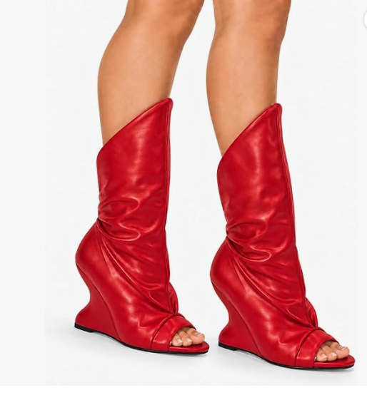 PACO-3 RED FAUX LEATHER  PEEP TOE BOOT WITH ASSYMETRICAL SHAFT AND SCULPTED CUT OUT WEDGE HEEL