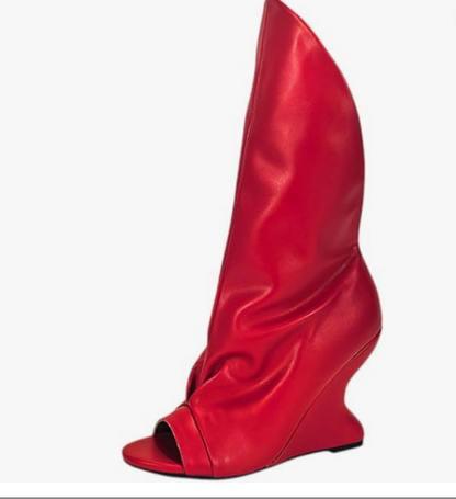 PACO-3 RED FAUX LEATHER  PEEP TOE BOOT WITH ASSYMETRICAL SHAFT AND SCULPTED CUT OUT WEDGE HEEL