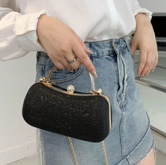 PAIGE BLACK DRESSY CLUTCH WITH RHINESTONE INSET GOLD HANDLE