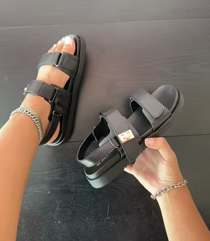 GIBSY-21

- Black faux leather
- Open Toe
- Double Strap
- Slingback sandal
- Flatform Sole, Approx. 1"
- Whole Sizes Only