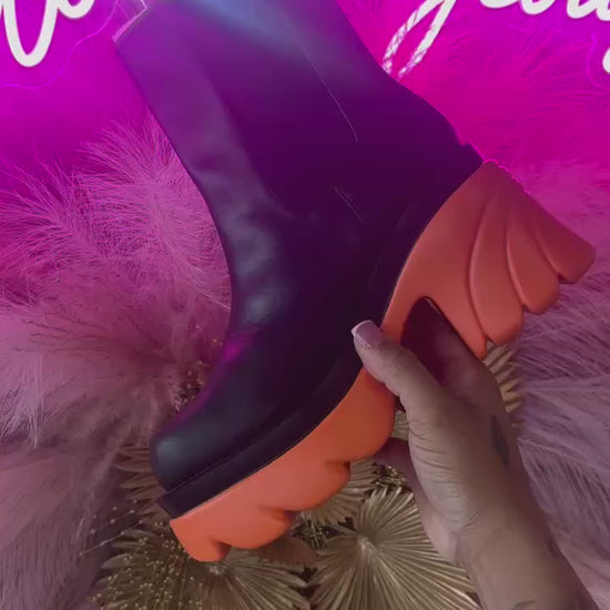 WeeBoo CITY-10 Orange

- Black Faux Leather
-&nbsp;Pull-On Chelsea Ankle Bootie
- Elastic Insets
- Chunky&nbsp;Orange Grooved&nbsp;Lug Sole &amp; Heel, Approx. 2"
- Also Available in Lilac,&nbsp;Hot Pink, Red