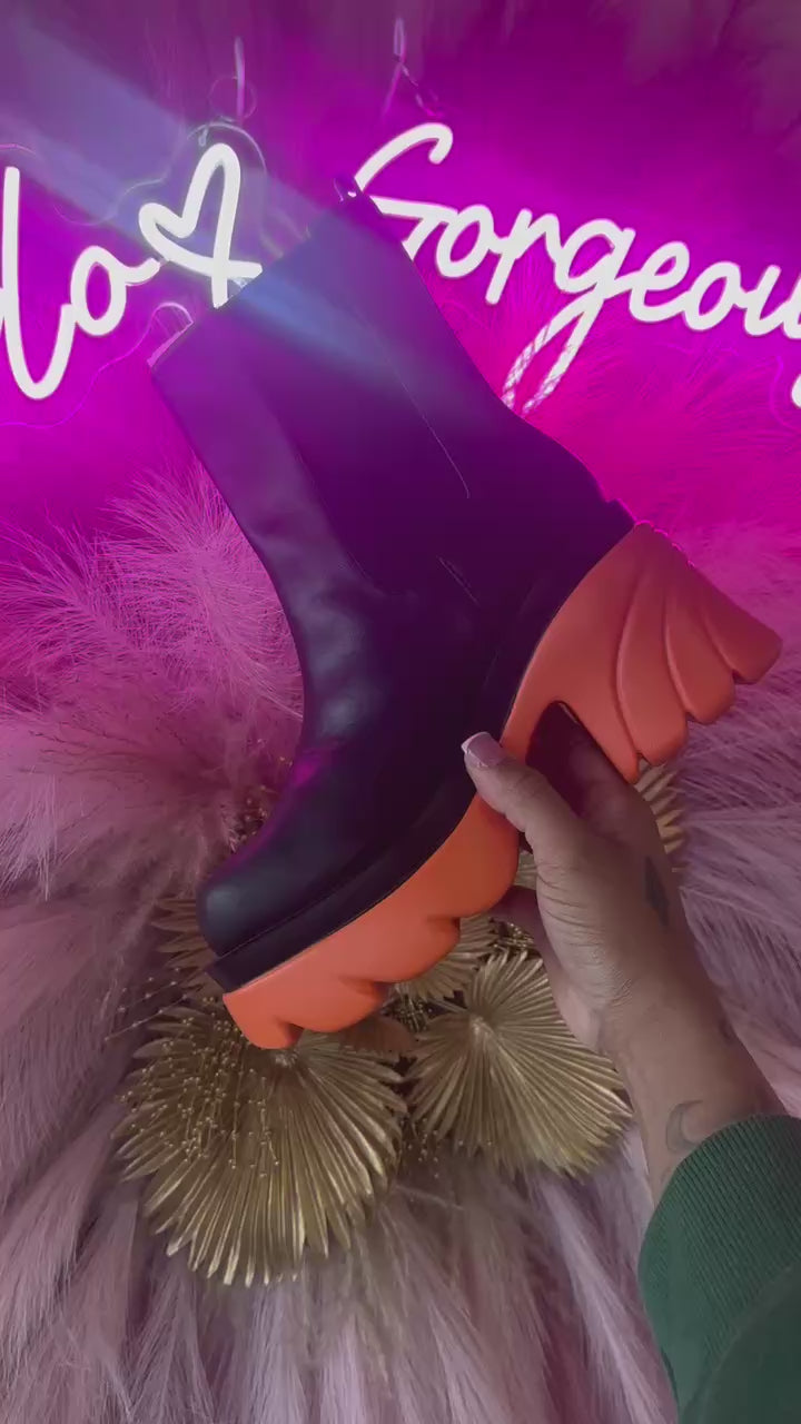 WeeBoo CITY-10 Orange

- Black Faux Leather
-&nbsp;Pull-On Chelsea Ankle Bootie
- Elastic Insets
- Chunky&nbsp;Orange Grooved&nbsp;Lug Sole &amp; Heel, Approx. 2"
- Also Available in Lilac,&nbsp;Hot Pink, Red