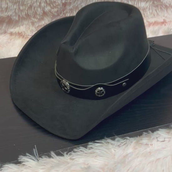 -faux suede cowboy hat in black

-black faux leather band with gunmetal stars detail

-interior ribbon inside hat to customize size

-stiff, sturdy structure