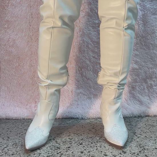 EVERYWHERE-3 white

- White Faux Leather Cowboy Boot
- Rhinestone Detail
- Pointy Toe Thigh High
- Cone Stacked Heel, Approx. 3.5"