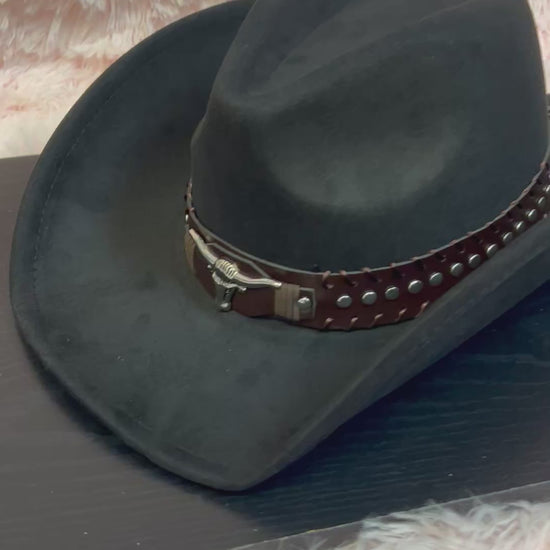 -faux suede cowboy hat in black

-brown faux leather band with silver studs and bull detail

-interior ribbon inside hat to customize size

-stiff, sturdy structure