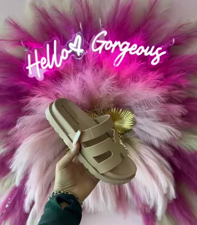 GINO-24

- Nude Tan Sandal
- Open Toe
- Cutout Vamp Detail
- Slip-On Slide
- Flatform Sole, Approx. 1"
- Whole Sizes Only