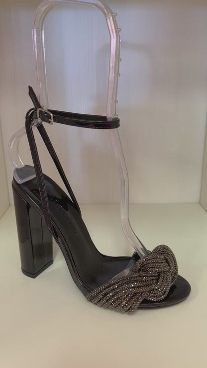 MORRINA-25 BLACK PATENT LEATHER OPEN TOE BLOCK HEEL WITH KNOTTED RHINESTONE VAMP
