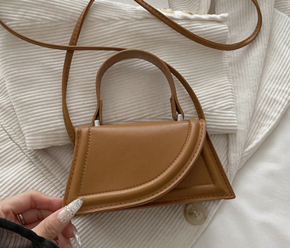 SONDRA CAMEL FAUX LEATHER MINIBAG WITH ASYMMETRICAL FOLD DESIGN SMALL HANDLE AND OPTIONAL CROSSBODY STRAP (Copy)