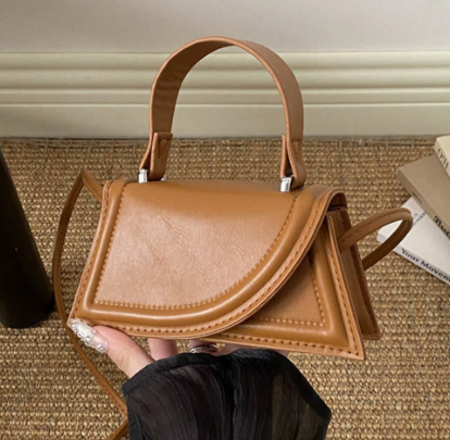 SONDRA CAMEL FAUX LEATHER MINIBAG WITH ASYMMETRICAL FOLD DESIGN SMALL HANDLE AND OPTIONAL CROSSBODY STRAP (Copy)