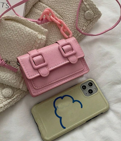 TRINA BABY PINK MINI BAG WITH DOUBLE BUCKLE DESIGN AND CROSS BODY STRAP (Copy)