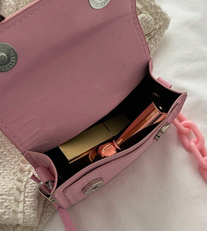 TRINA BABY PINK MINI BAG WITH DOUBLE BUCKLE DESIGN AND CROSS BODY STRAP (Copy)