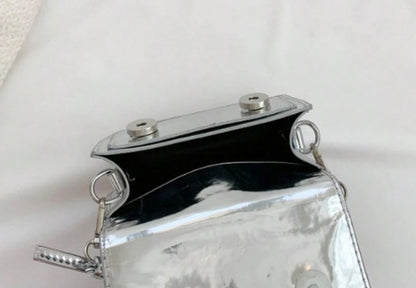 TRINA SILVER MINI BAG WITH DOUBLE BUCKLE DESIGN AND CROSS BODY STRAP