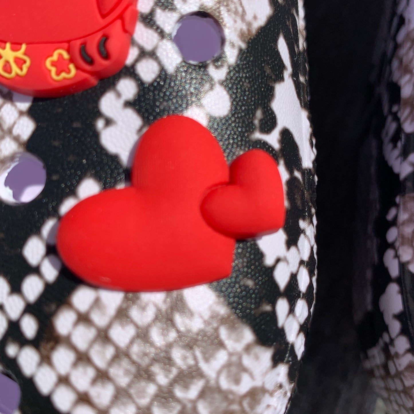 a close up of a heart shaped cake 