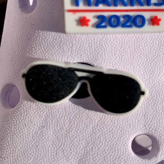 a pair of scissors sitting on top of a table 