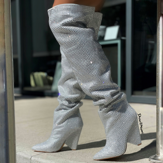 Liliana NANO-1 Silver

- Silver Rhinestone Encrusted Boots
- Over the Knee Thigh High Slouch Boots
- Pointy Toe
- Tapered Cone Heel, Approx. 4"
- Also Available in Nude, Pink, Black