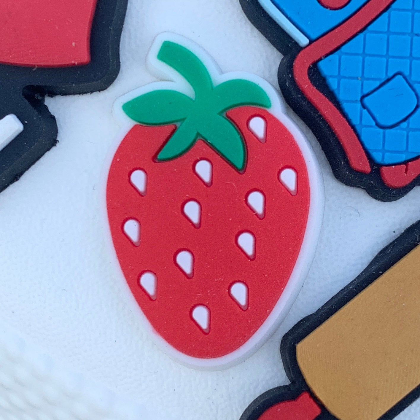 a close up of a remote control on a table 