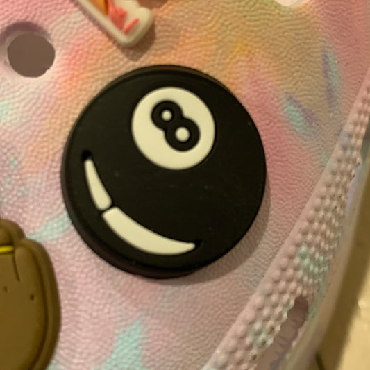 a close up of a black and white toilet 