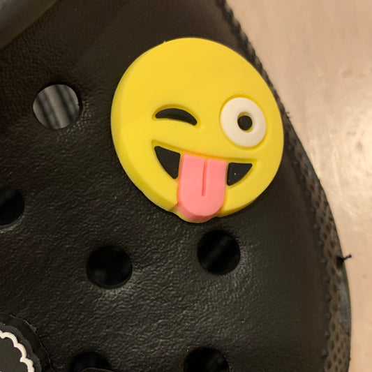 a close up of a stuffed animal with a face 